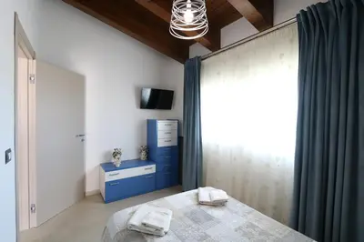 Letto o letti in una camera di Villa Eumenidi with pool
