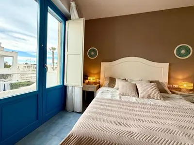 Letto o letti in una camera di Brezza Marina Borgo Rio Favara