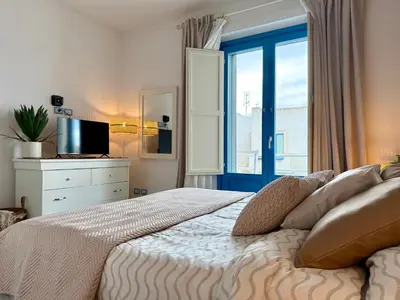 Letto o letti in una camera di Brezza Marina Borgo Rio Favara