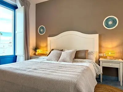Letto o letti in una camera di Brezza Marina Borgo Rio Favara