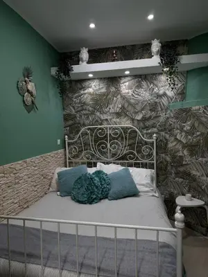 Letto o letti in una camera di Martina Home