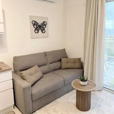 Area soggiorno di MarzAura Elegant Holiday Home in Marzamemi