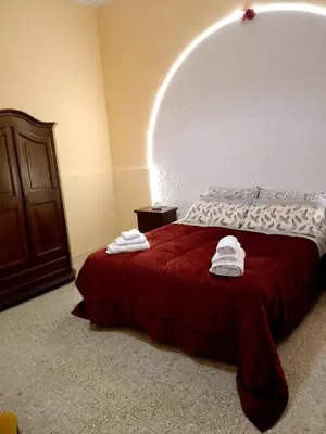 Letto o letti in una camera di Bred breakfast D&D