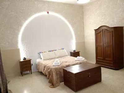 Letto o letti in una camera di Bred breakfast D&D