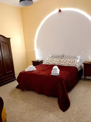 Letto o letti in una camera di Bred breakfast D&D
