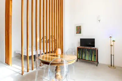 TV o dispositivi per l'intrattenimento presso Pindaro House by Ortigia Apartments