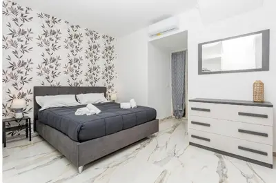 Letto o letti in una camera di Patryk & Toto Houses