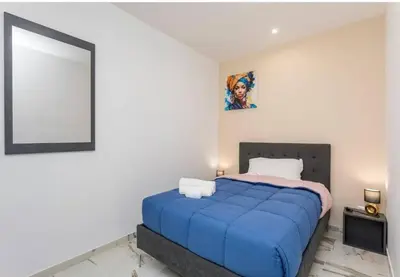 Letto o letti in una camera di Patryk & Toto Houses