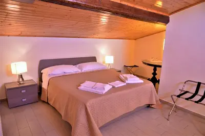 Letto o letti in una camera di Al Teatro Massimo Home