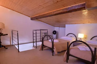 Letto o letti in una camera di Al Teatro Massimo Home