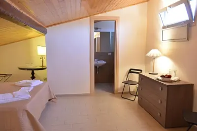 Letto o letti in una camera di Al Teatro Massimo Home