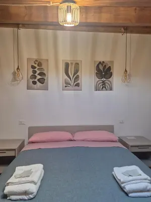Letto o letti in una camera di Il nido del viandante