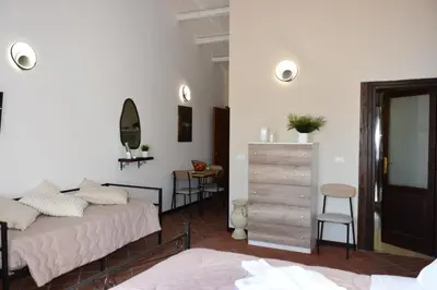 Letto o letti in una camera di La Dimora di Teti