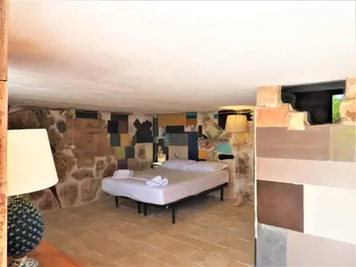 Area soggiorno di Apartment Giniusa' Studio mit Whirlpool-Badewanne by Interhome