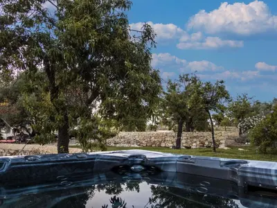 Giardino di Apartment Giniusa' Studio mit Whirlpool-Badewanne by Interhome