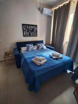 Letto o letti in una camera di Due passi a Ortigia