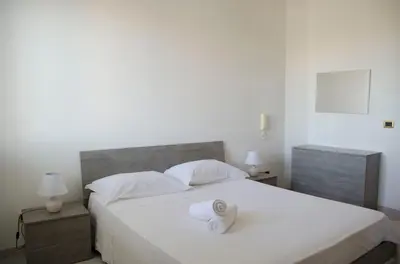 Letto o letti in una camera di Villa Noto