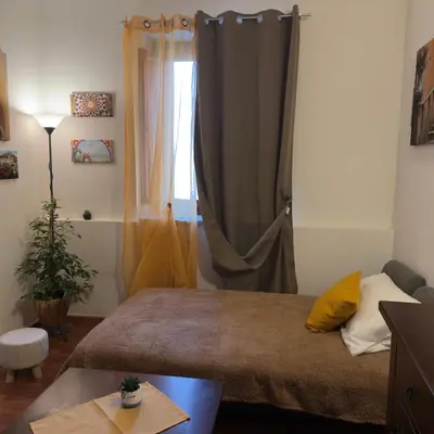 Letto o letti in una camera di Ortigia Plemmirio al Primo Piano