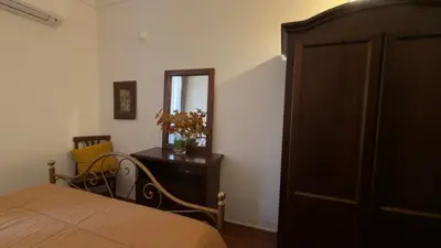Letto o letti in una camera di Ortigia Plemmirio al Primo Piano