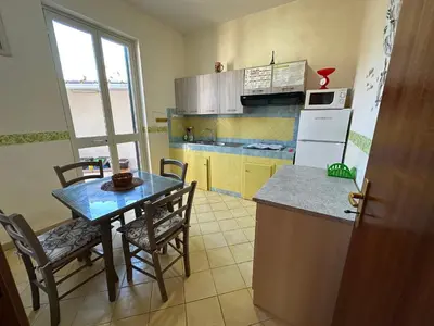 Cucina o angolo cottura di Kitiya's House- Di fronte la spiaggia e un mare cristallino