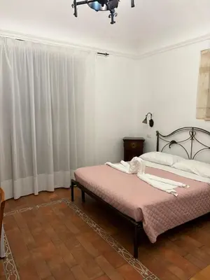 Letto o letti in una camera di B&B Mirabella Rooms Ortigia