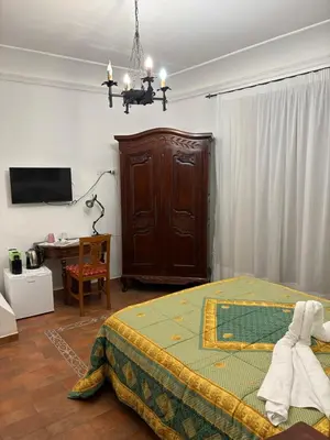 Letto o letti in una camera di B&B Mirabella Rooms Ortigia