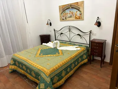 Letto o letti in una camera di B&B Mirabella Rooms Ortigia