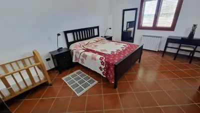 Letto o letti in una camera di Villa CARLOTTA