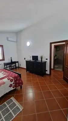Letto o letti in una camera di Villa CARLOTTA