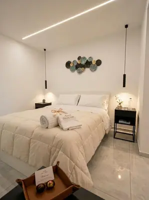 Letto o letti in una camera di Aura - Luxury Suite