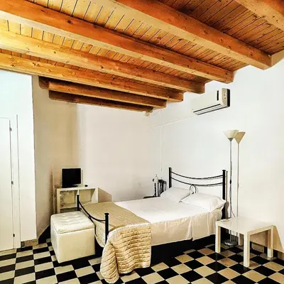 Letto o letti in una camera di Pantalica Rooms Affittacamere Sortino Siracusa