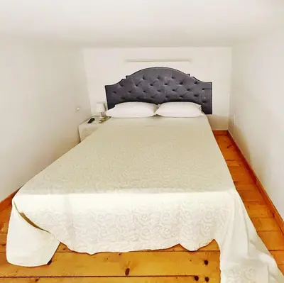 Letto o letti in una camera di Pantalica Rooms Affittacamere Sortino Siracusa