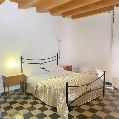 Letto o letti in una camera di Pantalica Rooms Affittacamere Sortino Siracusa