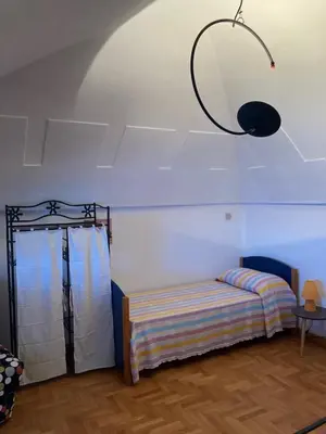 Letto o letti in una camera di Tolomei House Holidays Sea View
