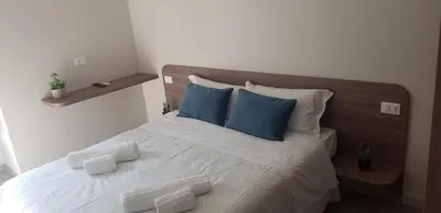 Letto o letti in una camera di Tre Stelle al Duomo