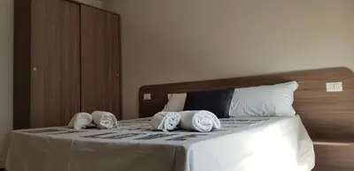 Letto o letti in una camera di Tre Stelle al Duomo