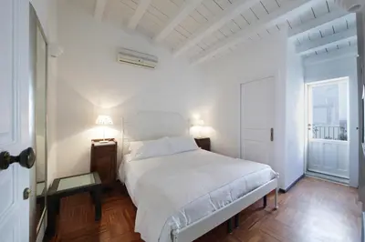 Letto o letti in una camera di B&B Five Rooms