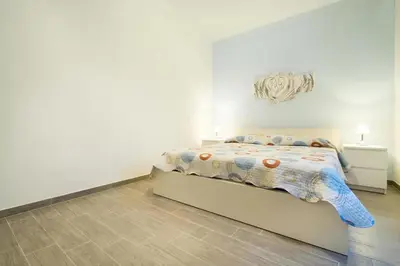 Letto o letti in una camera di Talia Ortigia Apartment