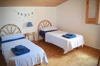 Letto o letti in una camera di Bedda Casa Al Mare