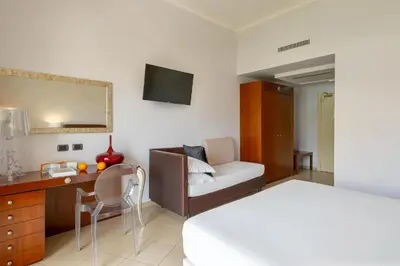 Letto o letti in una camera di Grand Hotel Sofia
