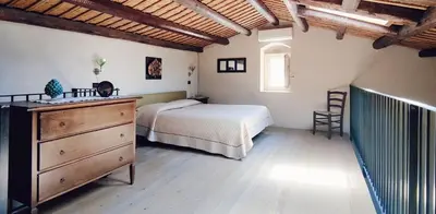 Letto o letti in una camera di Palazzo Gambuzza