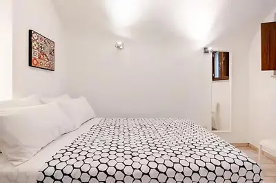 Letto o letti in una camera di Apollo Home