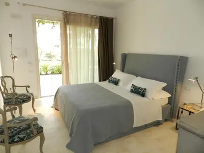 Letto o letti in una camera di Scilla Maris Charming Suites