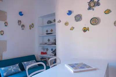 Area soggiorno di Family apt by Dimore in Sicily