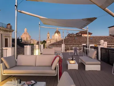 Area soggiorno di Duomo Suites & Spa