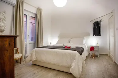 Letto o letti in una camera di Duomo Luxury Suite Catania