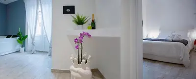 Letto o letti in una camera di Duomo Luxury Suite Catania
