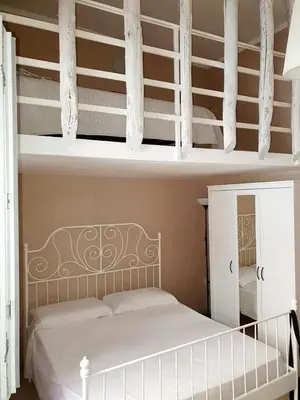 Letto o letti in una camera di Appartamenti della Rotonda