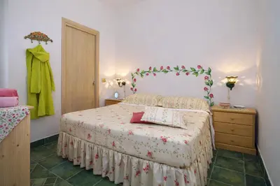 Letto o letti in una camera di Case di Fiori Beachfront villa with terrace and direct beach access