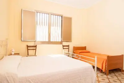 Letto o letti in una camera di Villa Svizzera